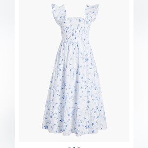 Well loved worn Ellie Nap Dress by Hill House in classic Blue Botanical.